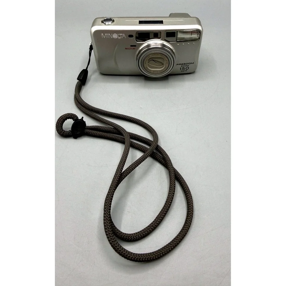 Minolta Freedom Zoom 150 Date 35mm Film Camera Silver 37.5-150mm Multi AF, Works